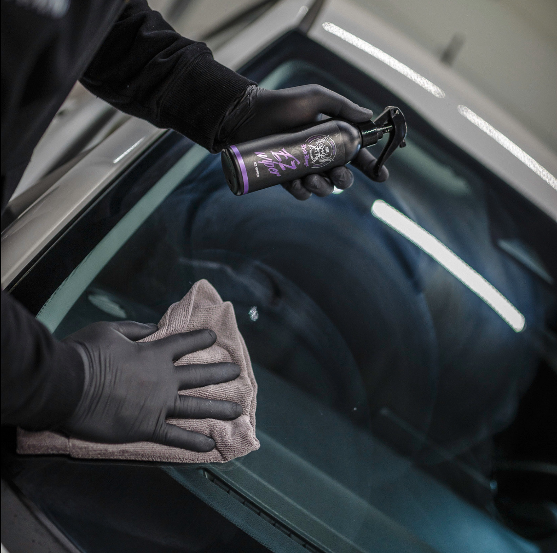 EZ Wiper – Gloved hand using grey microfibre cloth to apply glass sealant to car side window for hydrophobic protection | Car Glass | miio Store