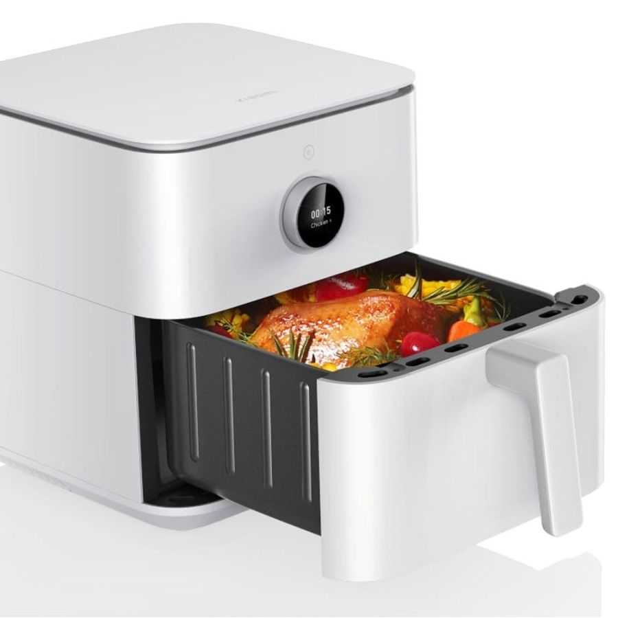 Cook succulent chicken and healthy vegetables, easily removed from the fryer base.